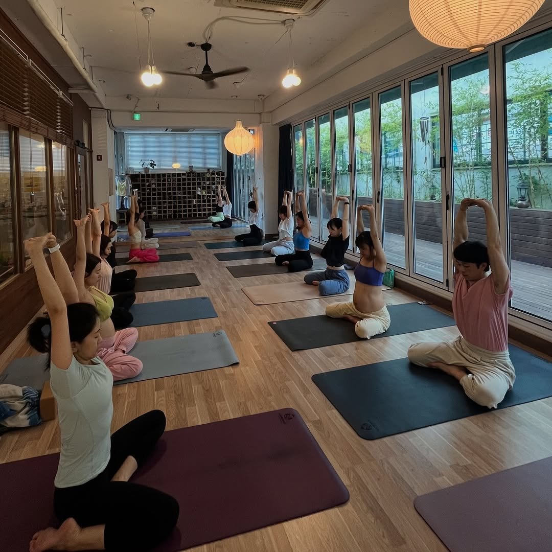 Photo by 려경 요가 on August 10, 2025. May be an image of 4 people, people practicing yoga and text.