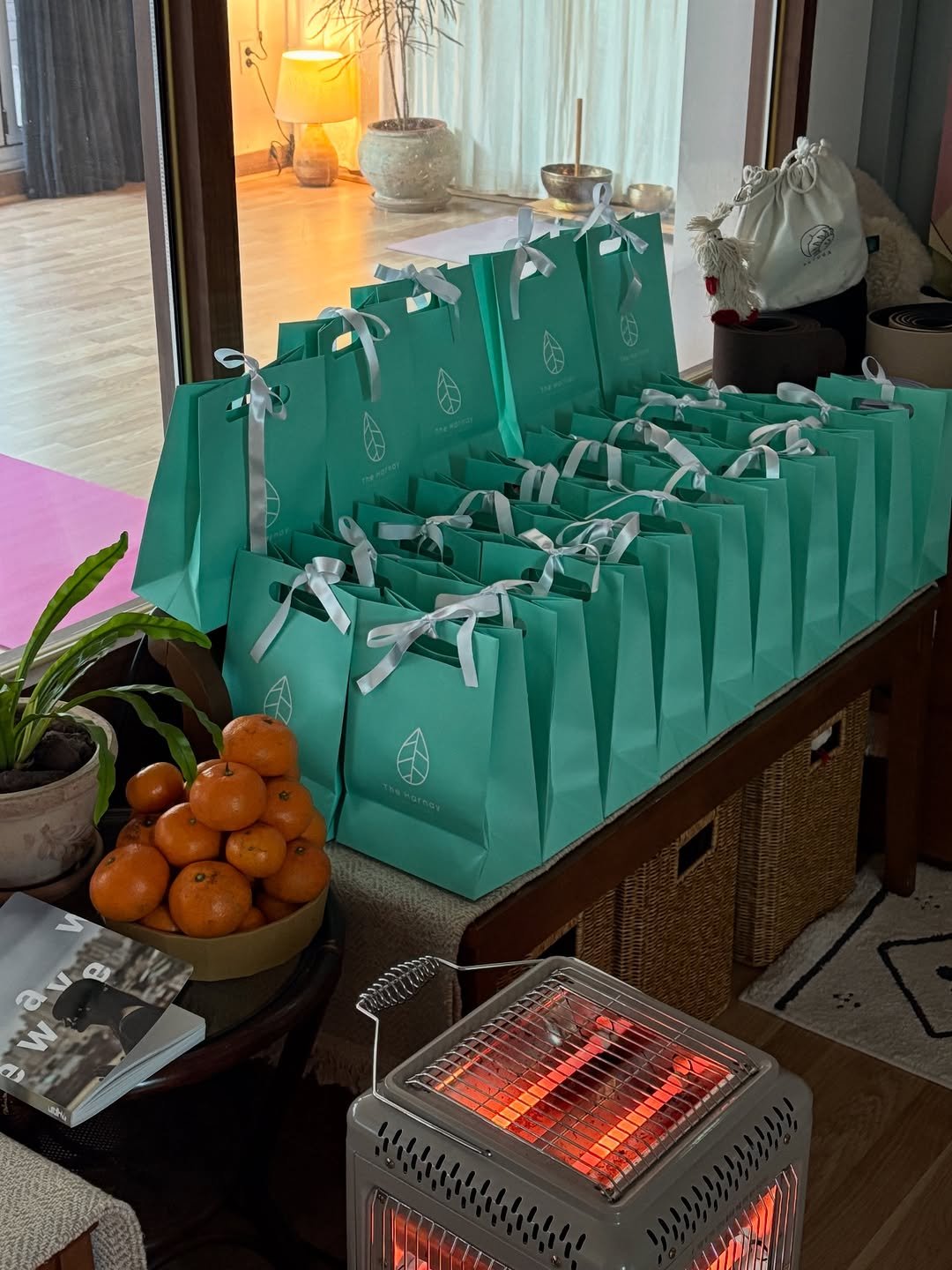 Photo shared by 려경 요가 on December 25, 2025 tagging @theharnay_official. May be an image of stove, cooler, fireplace and text.