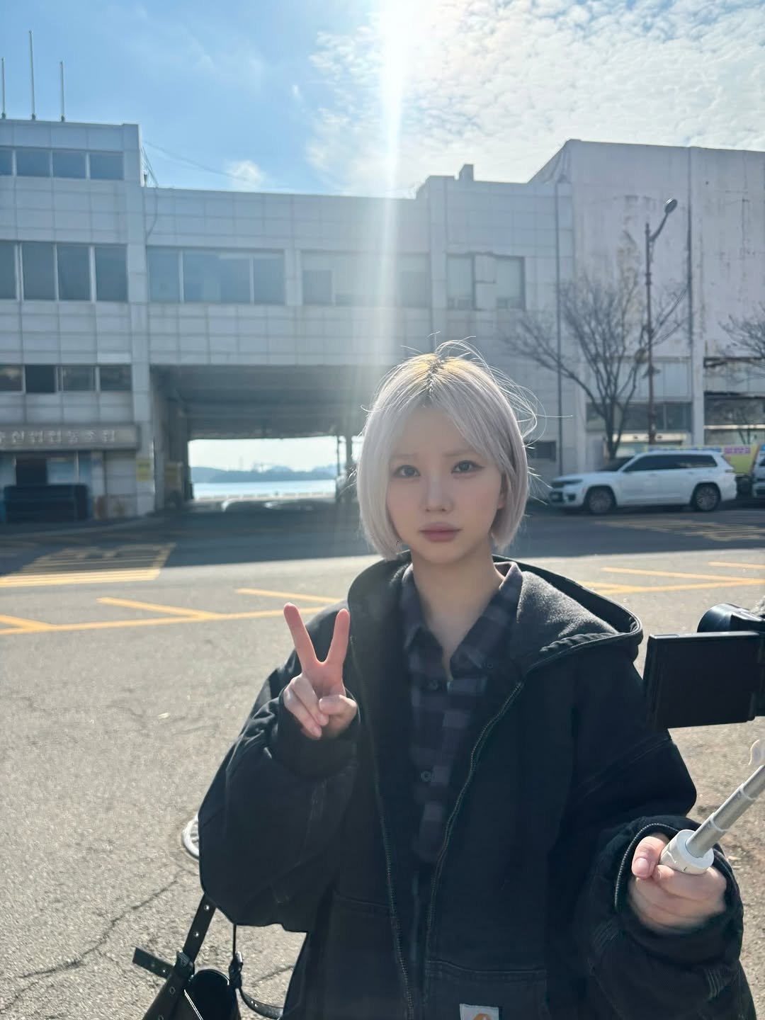 Photo by Eunha on November 25, 2025. May be an image of one or more people, hair, duffle coat, parka and text.