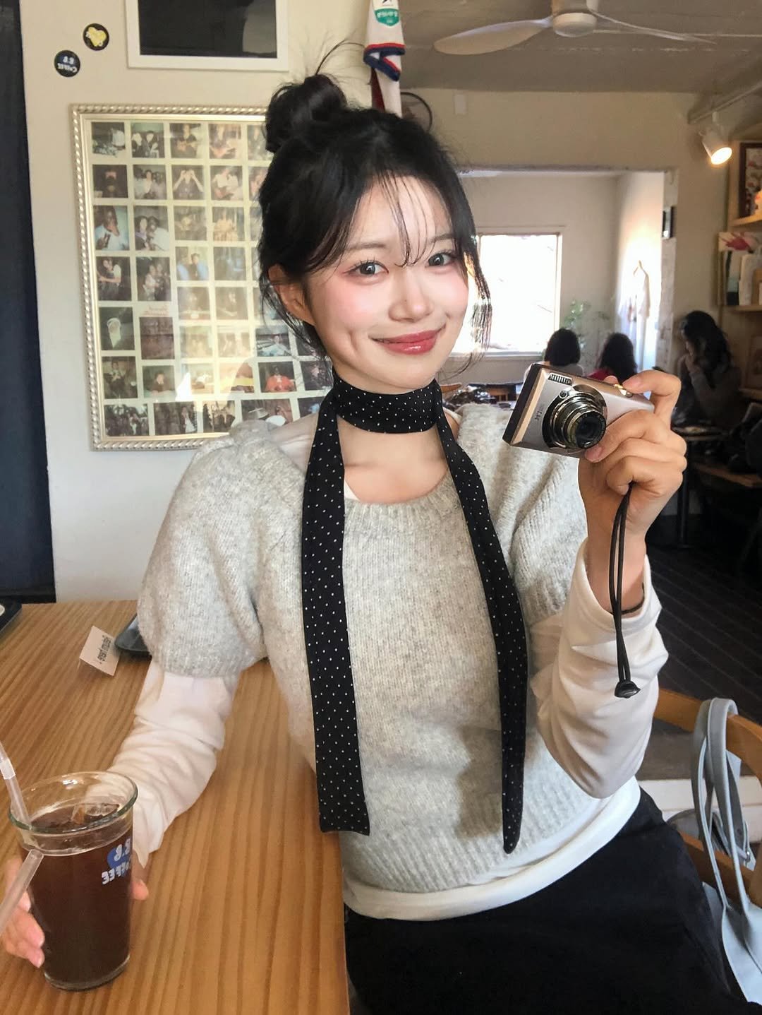 Photo shared by 노정화 on February 11, 2026 tagging @dayroze_official. May be an image of one or more people, hair, turtleneck, choker, bolo tie and text.
