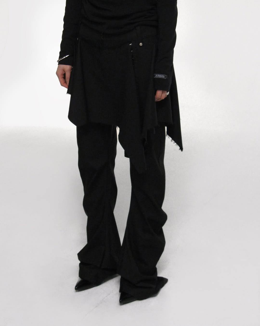 Photo by ROCKCAKE on February 16, 2026. May be an image of cloak, costume, turtleneck, outerwear and text.