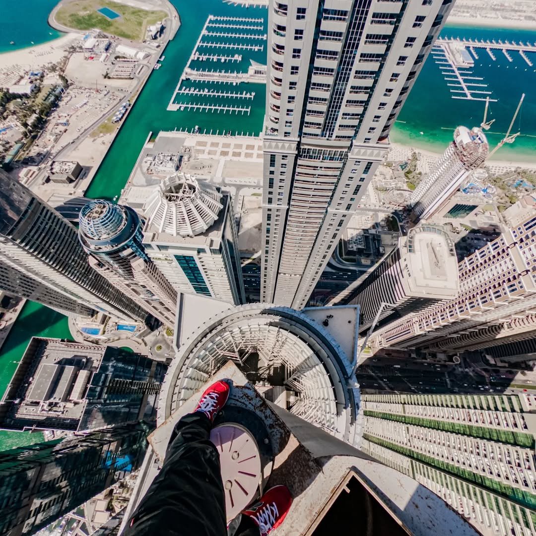 Photo by Rodion Lorax on March 02, 2026. May be an image of skydiving, skyscraper, tower and text.