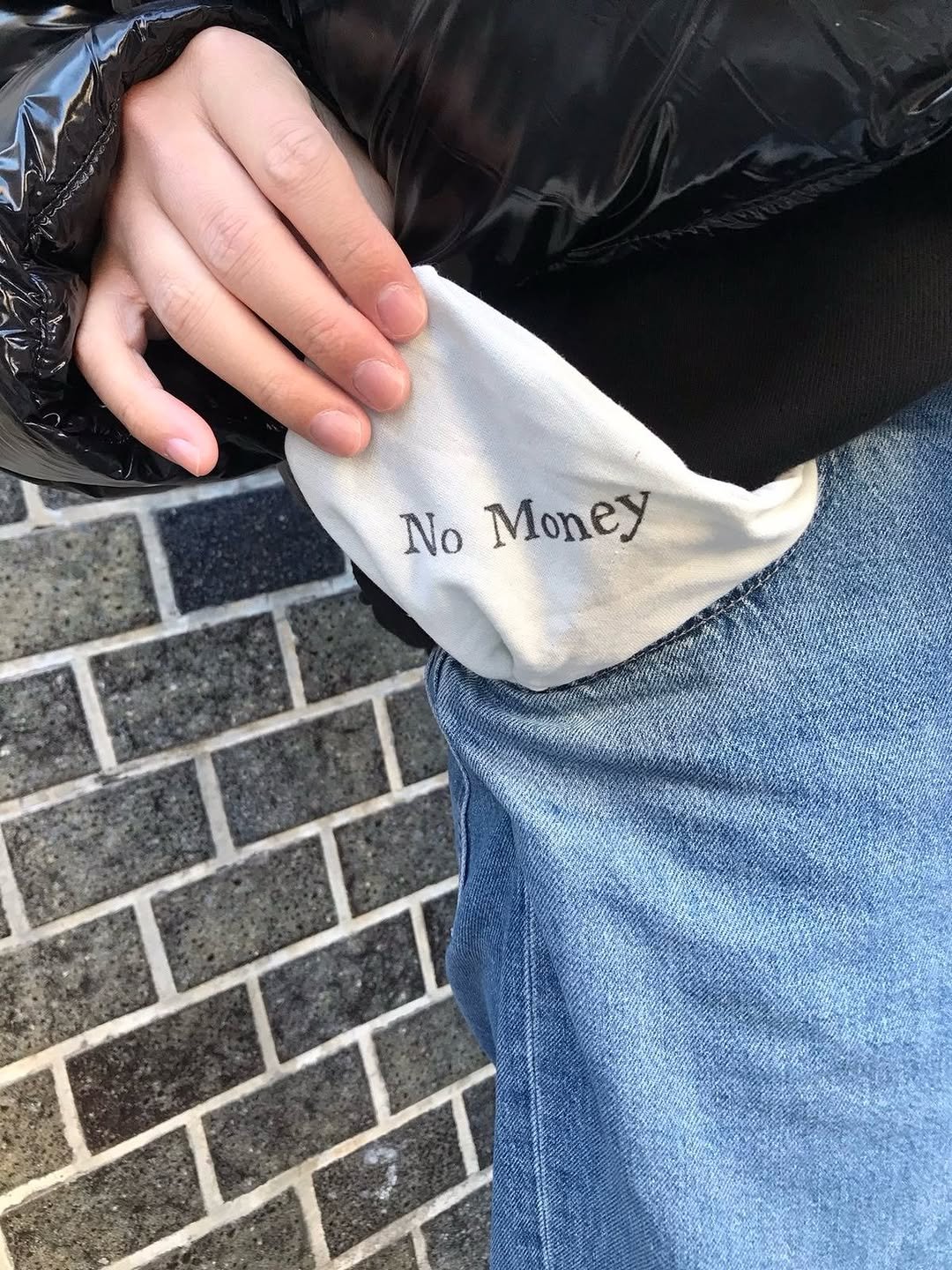 Photo by SEONGSU KIM on February 20, 2026. May be an image of text that says 'No Money'.