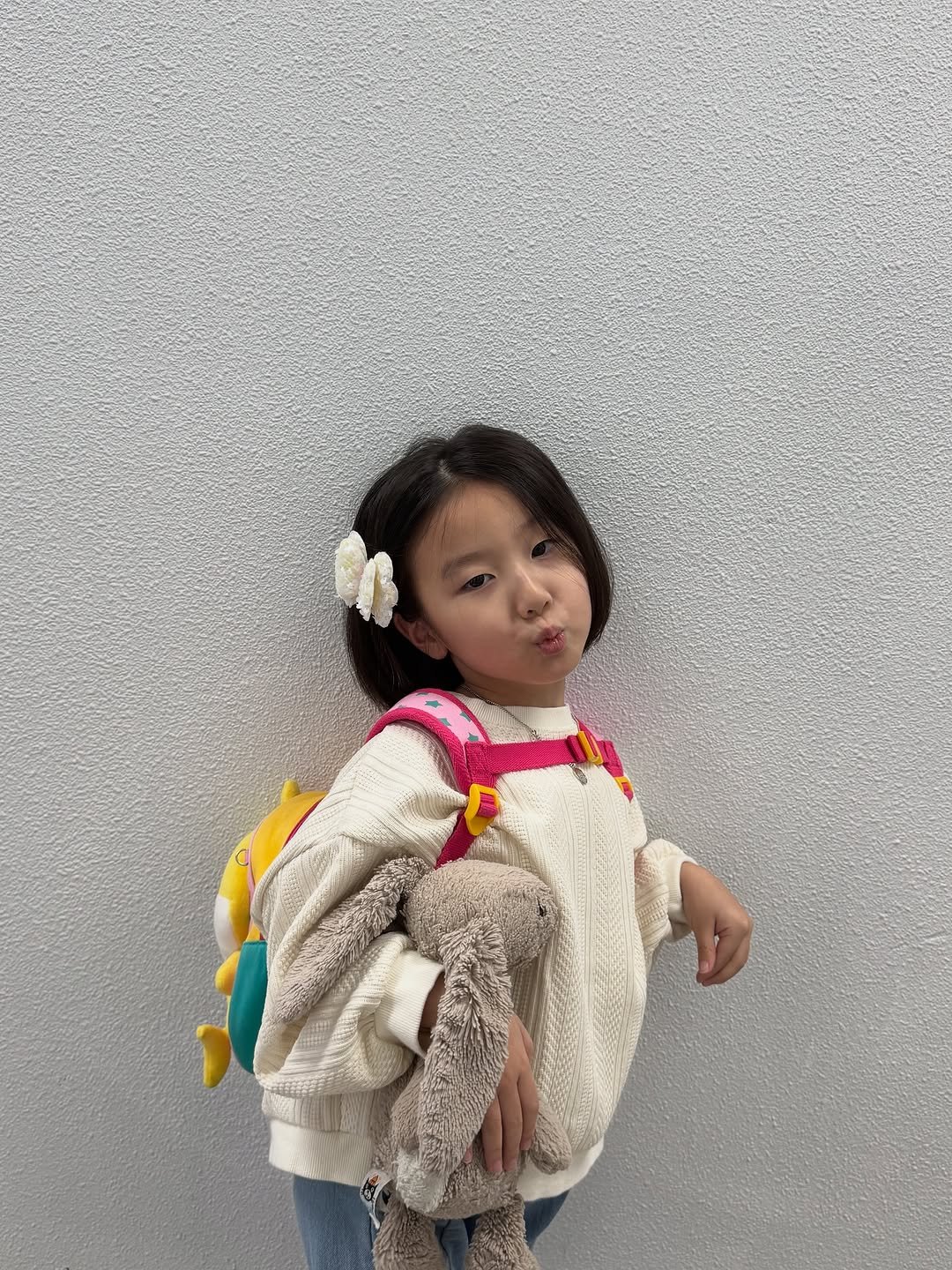 Photo by 로로커넥트 대표 | 문지우 on November 03, 2025. May be an image of baby, duffle coat, sling, doll, knit and text.