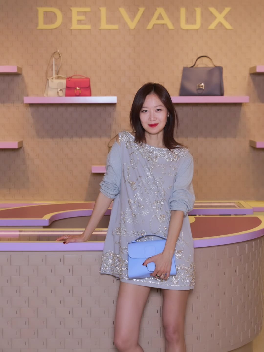 Photo shared by Hjk on February 07, 2026 tagging @driesvannoten, and @delvaux. May be an image of purse, dress, clutch and text that says 'DELVAUX'.