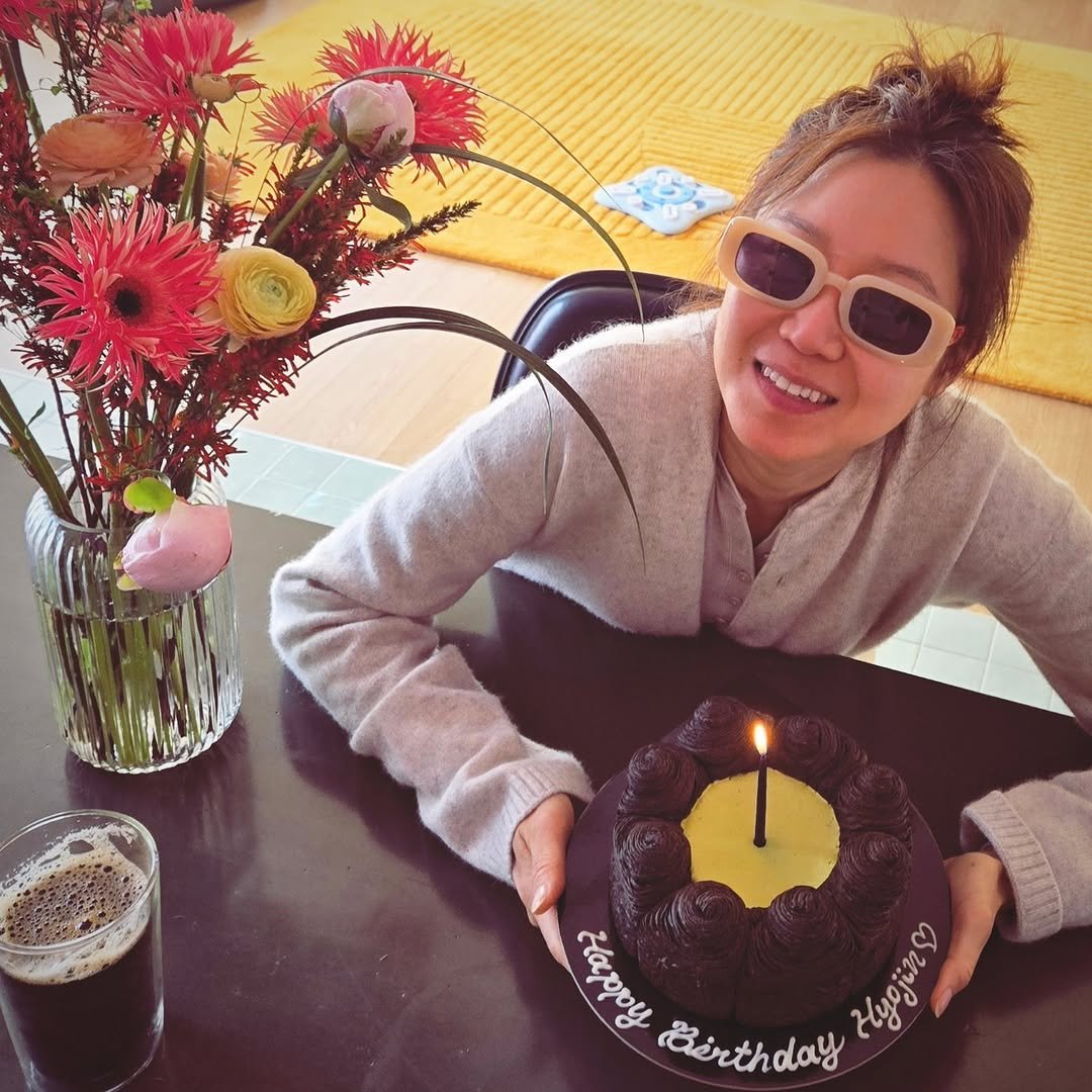 Photo by Hjk on April 04, 2026. May be an image of chocolate cake, candle, prairie gentian and text.