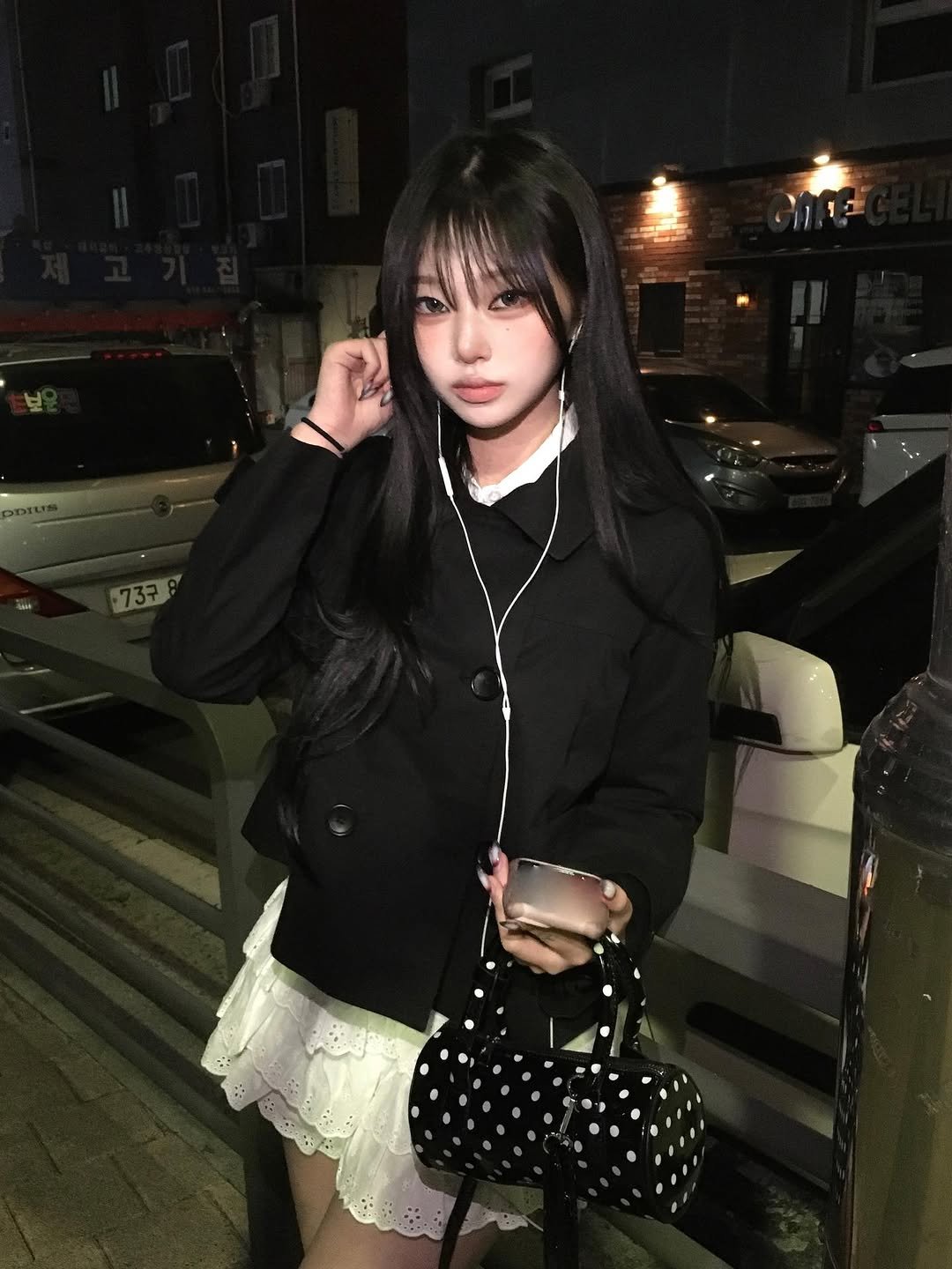Photo shared by 예령 on April 17, 2026 tagging @reise.miya. May be an image of miniskirt, night and text.