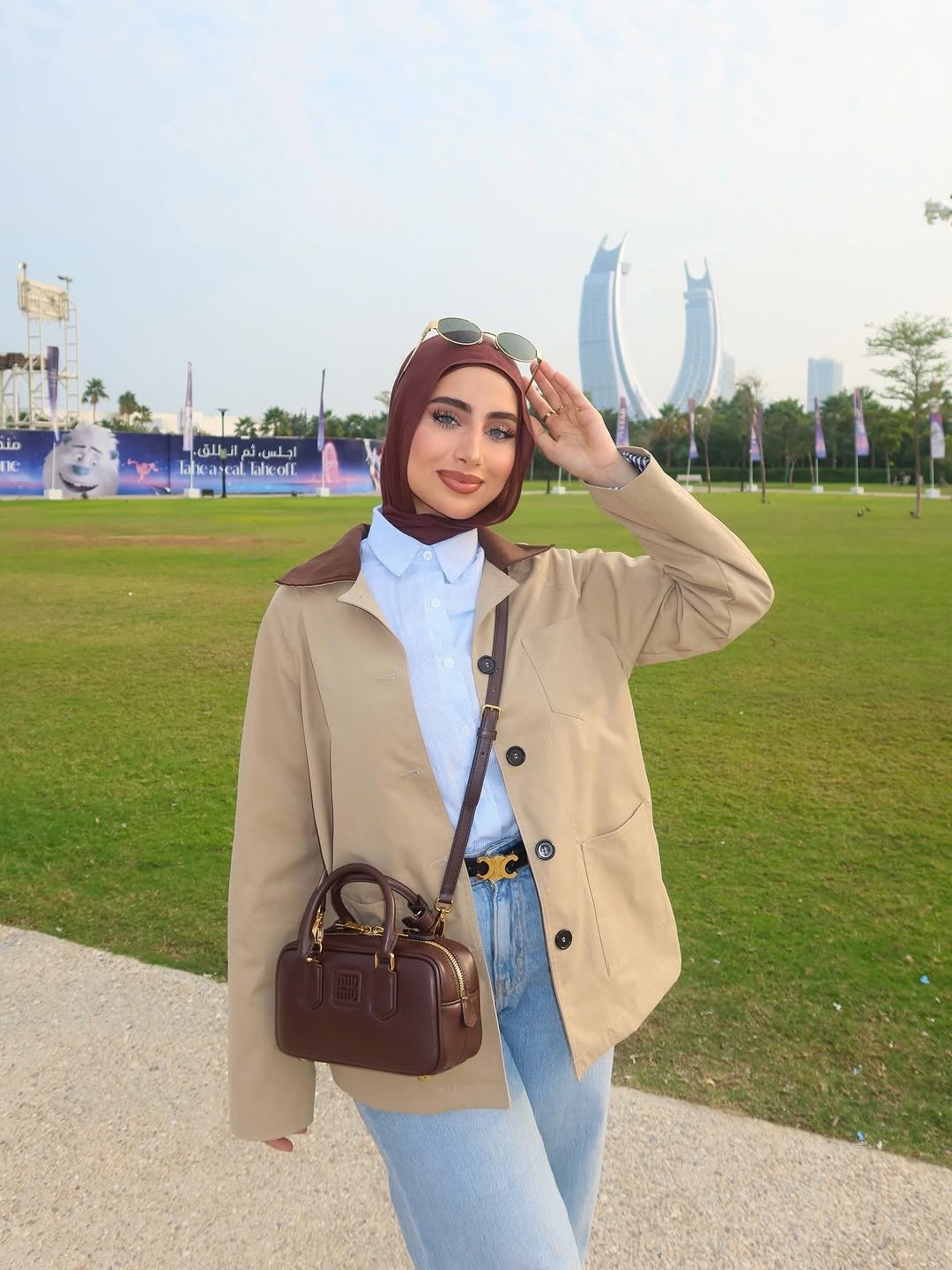 Photo by رغـد | Raghad on December 05, 2025. May be an image of headscarf, turban, outdoors, tower and text.