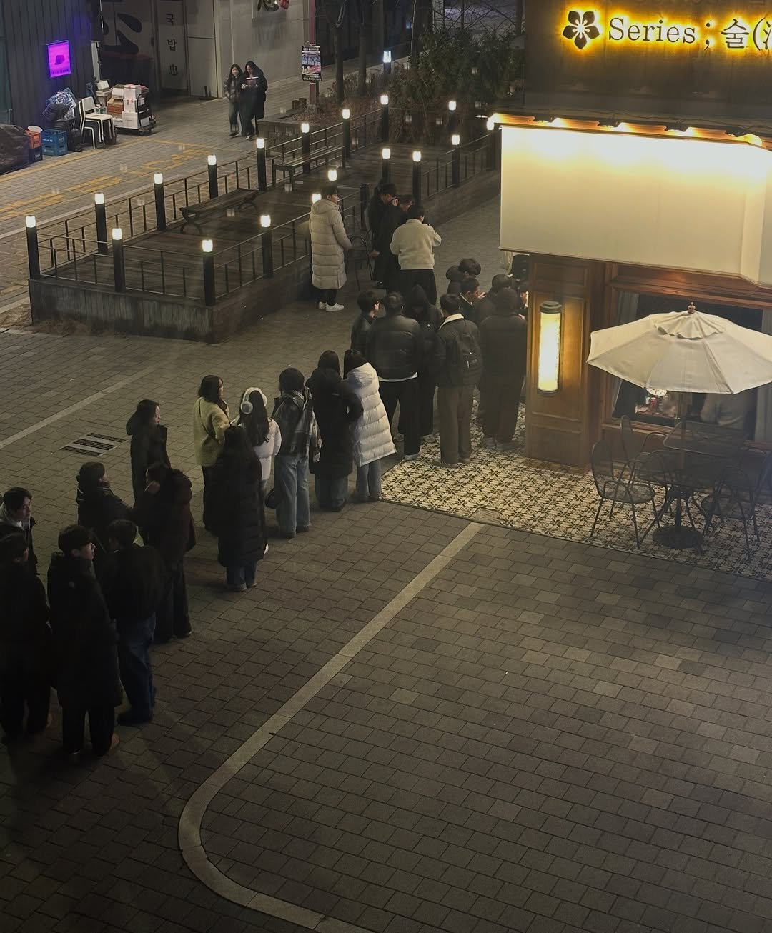 Photo by Injun You on January 08, 2026. May be an image of one or more people, lighting, signboard, crowd, street, night and text that says 'Series 술('.