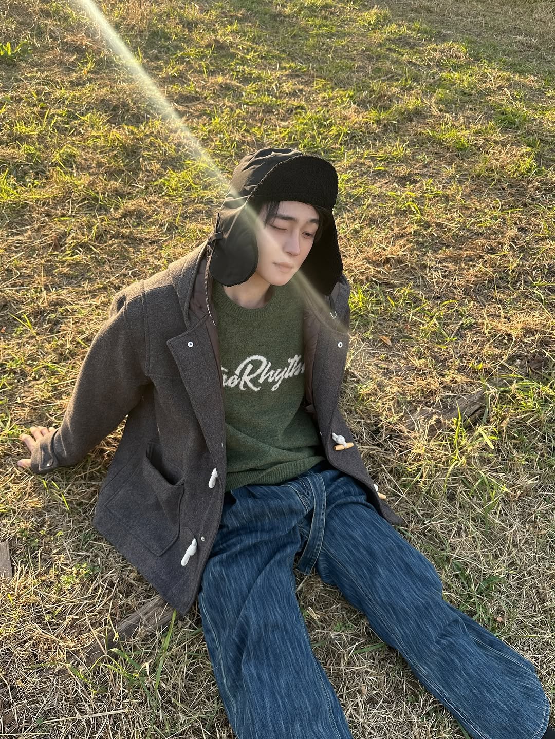 Photo by Injun You on November 15, 2025. May be an image of duffle coat, grass and text.
