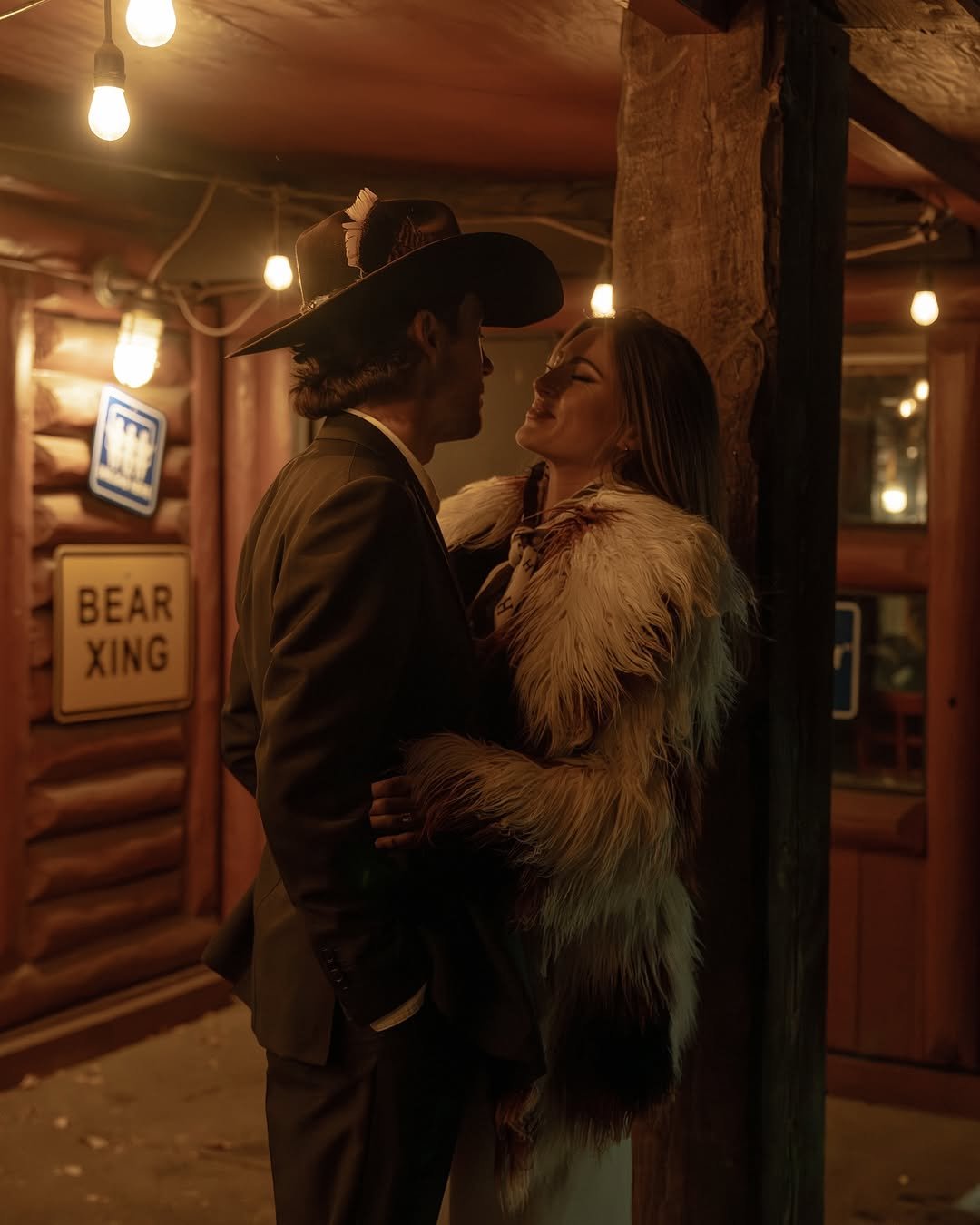 Photo by Gianna Blaney in Hickory House Ribs         Aspen & Parker, Co. with @ryanblaney10, @colinandlakin, and @karlispanglerevents. May be an image of people kissing, bowler hat, fur, bolo tie and text.
