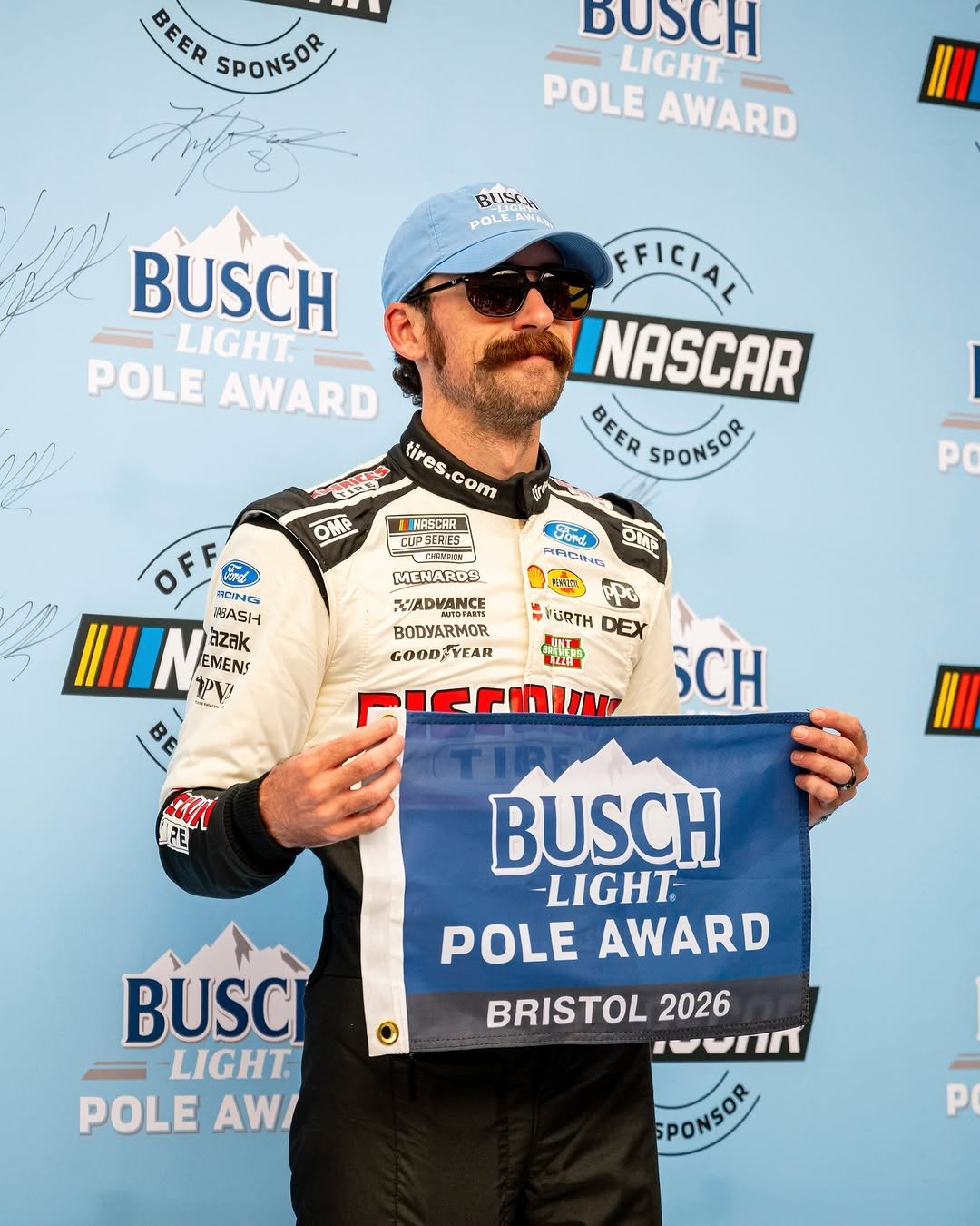 Photo shared by Team Penske on April 11, 2026 tagging @ryanblaney10, @fordracing, and @discount_tire. May be an image of racing vehicles, pole and text that says 'BEER BEER EERSPONSOR SPONSOR BUSCH LIGHT POLE AWARD BUSCN BUSCH LIGHT POLE AWARD tres.com tires. tires.com NASCAR CUPSERES FFICIAL NASCAR BEER SPONSOR SPONSOR OMP PO ARCIN QuTO Furd ठ MENARDS X/ADVANCE VANCE BODYARMOR GOODTYEAR N N GZaK tzak IIII N5ASH EMENS PV URTH DEX NUNI 2A SCH GE BUSCH -LIGHT POLE AWARD BUSCI LIGHT POLE AW/ BRISTOL 2026 .ynn SPONSOR SPONSOR P'.