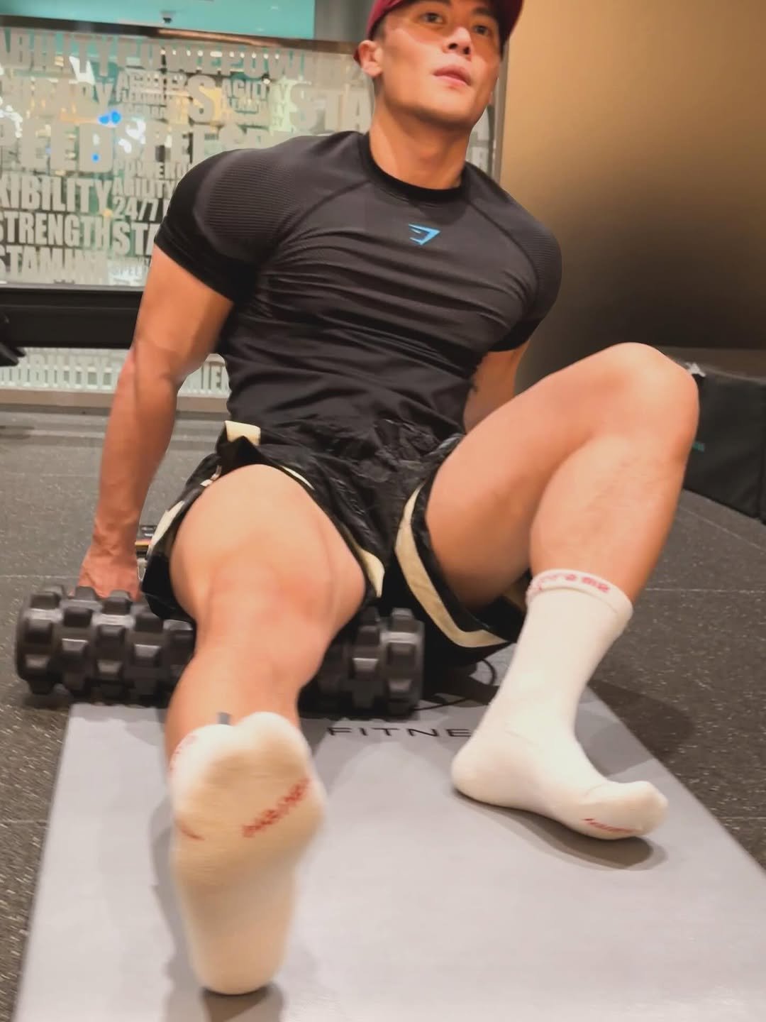 Photo by Ryan Ding on April 13, 2026. May be an image of body building, sportswear, sock and text.