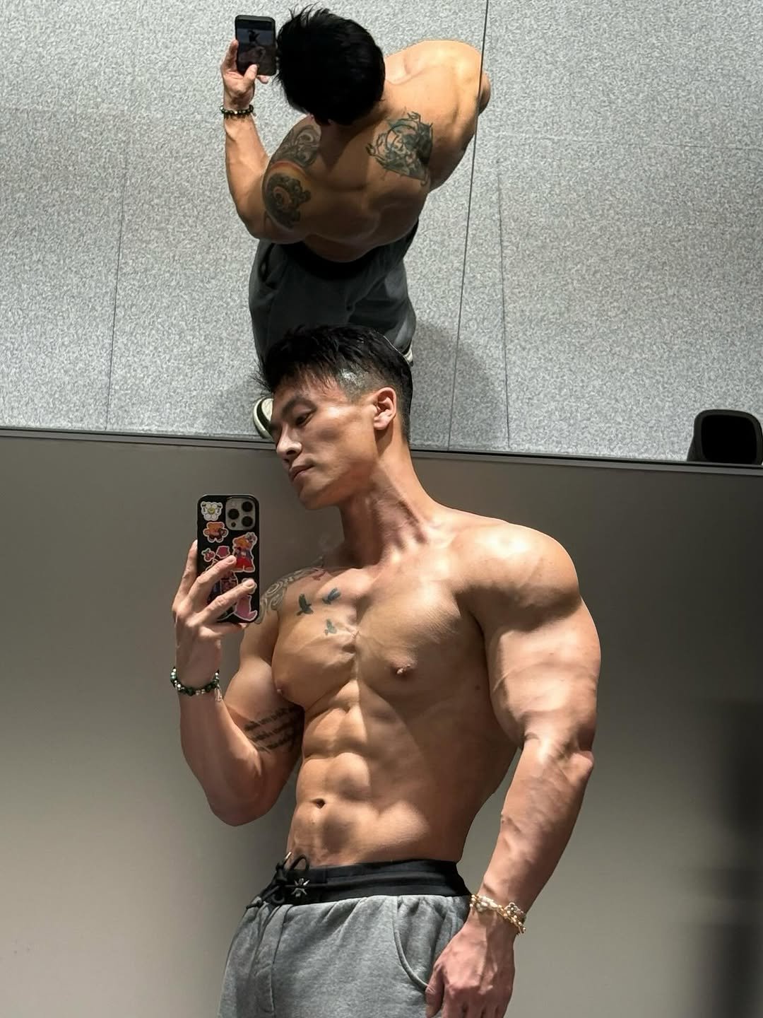 Photo by Ryan Ding on April 06, 2026. May be a selfie of one or more people, biceps, people bodybuilding and text.