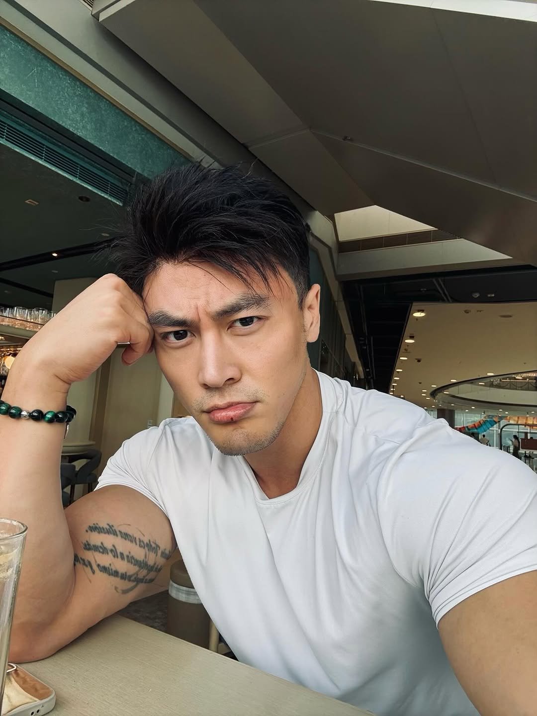 Photo by Ryan Ding on March 30, 2026. May be a selfie of one or more people, beard, hair, biceps and text.