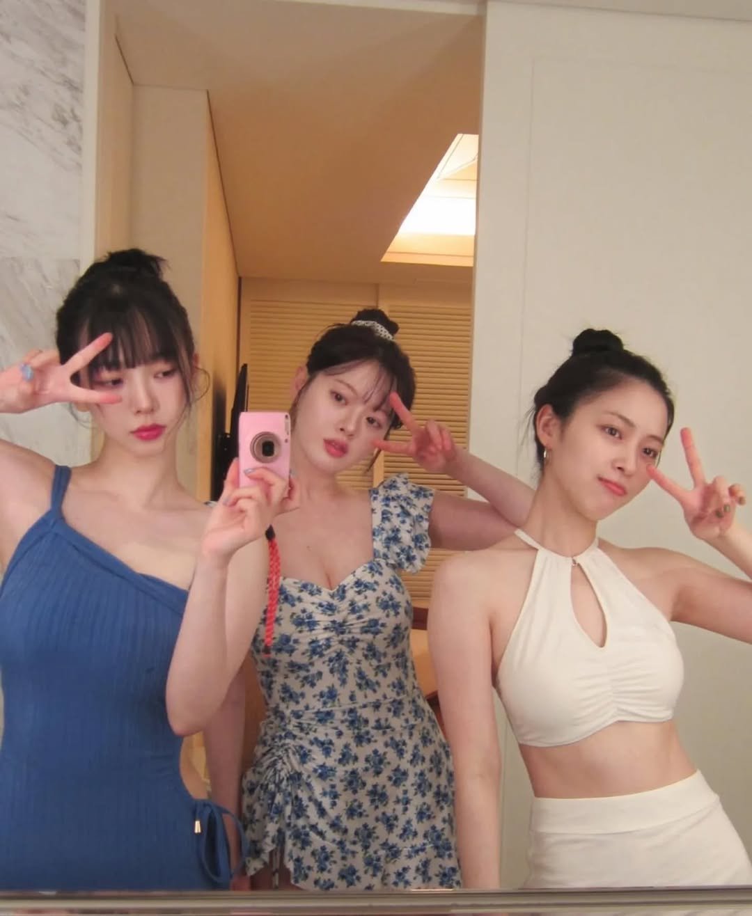 Photo by ITZY RYUJIN (신류진) on February 24, 2026. May be a selfie of one or more people, hair, bra, mirror, sundress and text.