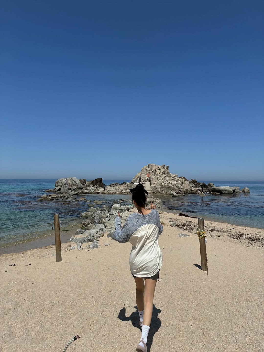 Photo by 김설현 on July 05, 2025. May be an image of 1 person, ocean, coast and text.