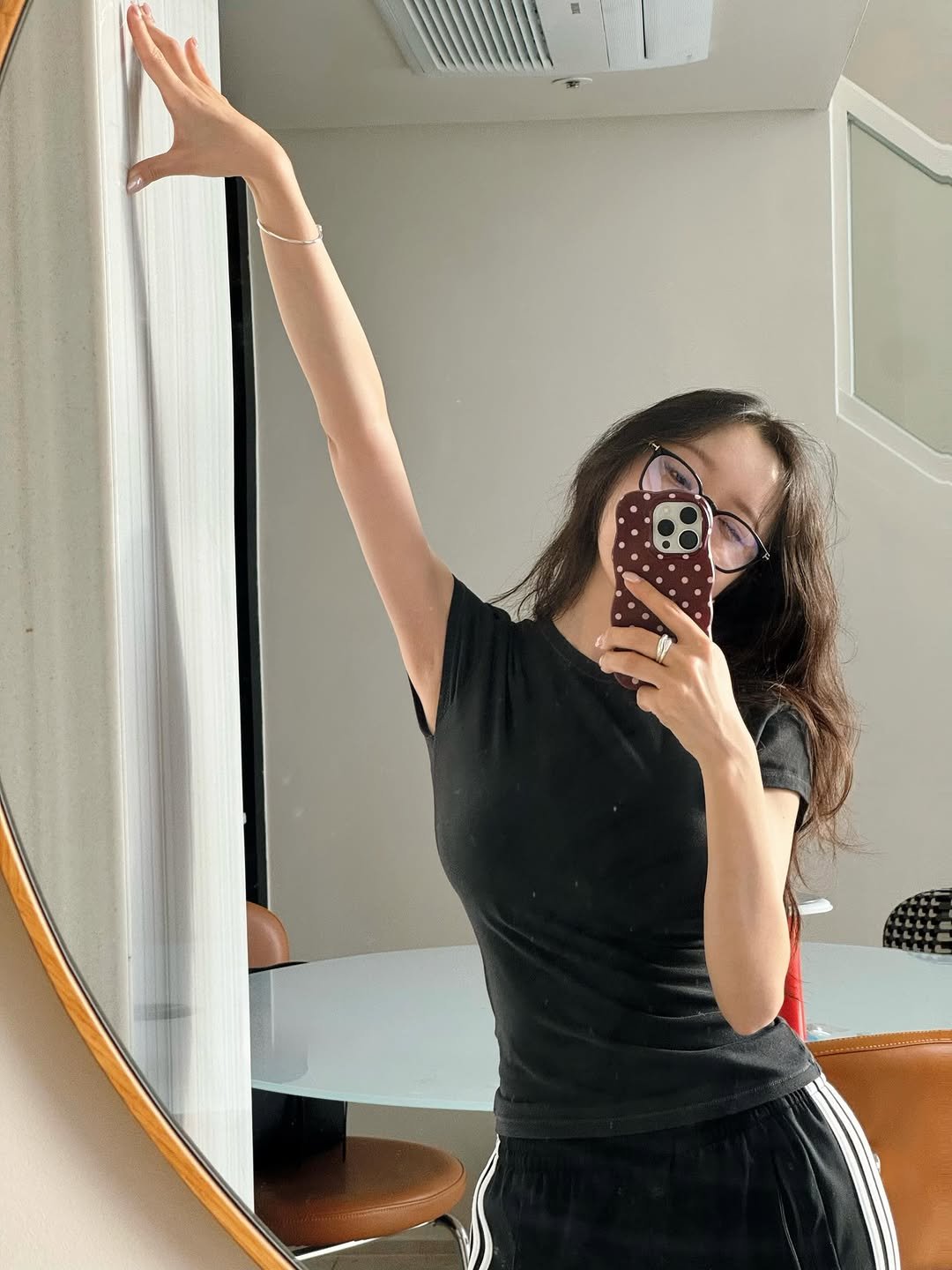 Photo by 이솔이 ✨ on April 23, 2026. May be a selfie of sweatpants, mirror and text.