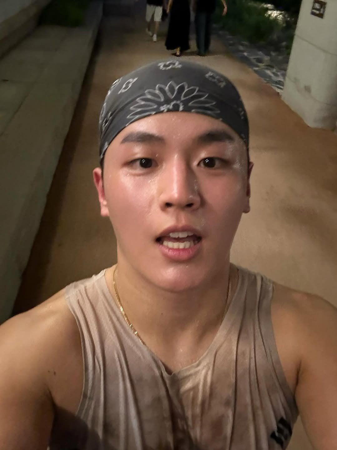 Photo by 김승겸 on August 15, 2025. May be a selfie of 3 people, biceps, sweat band, bandanna and text.