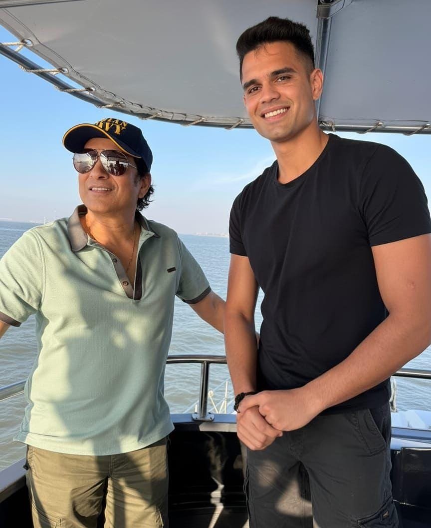 Photo shared by Sachin Tendulkar on September 23, 2025 tagging @arjuntendulkar24. May be an image of 2 people, boat and text.
