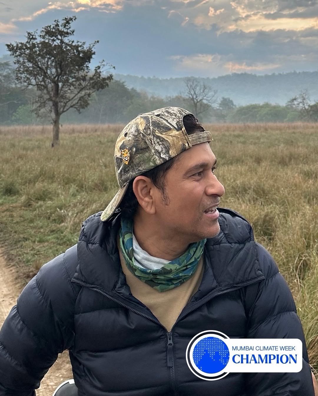 Photo shared by Sachin Tendulkar on February 13, 2026 tagging @mumbai_climateweek. May be an image of hat, parka, grass and text that says 'የትባኒ MUMBAI CLIMATE MUMBAICLIMATEWEEK WEEK CHAMPION'.