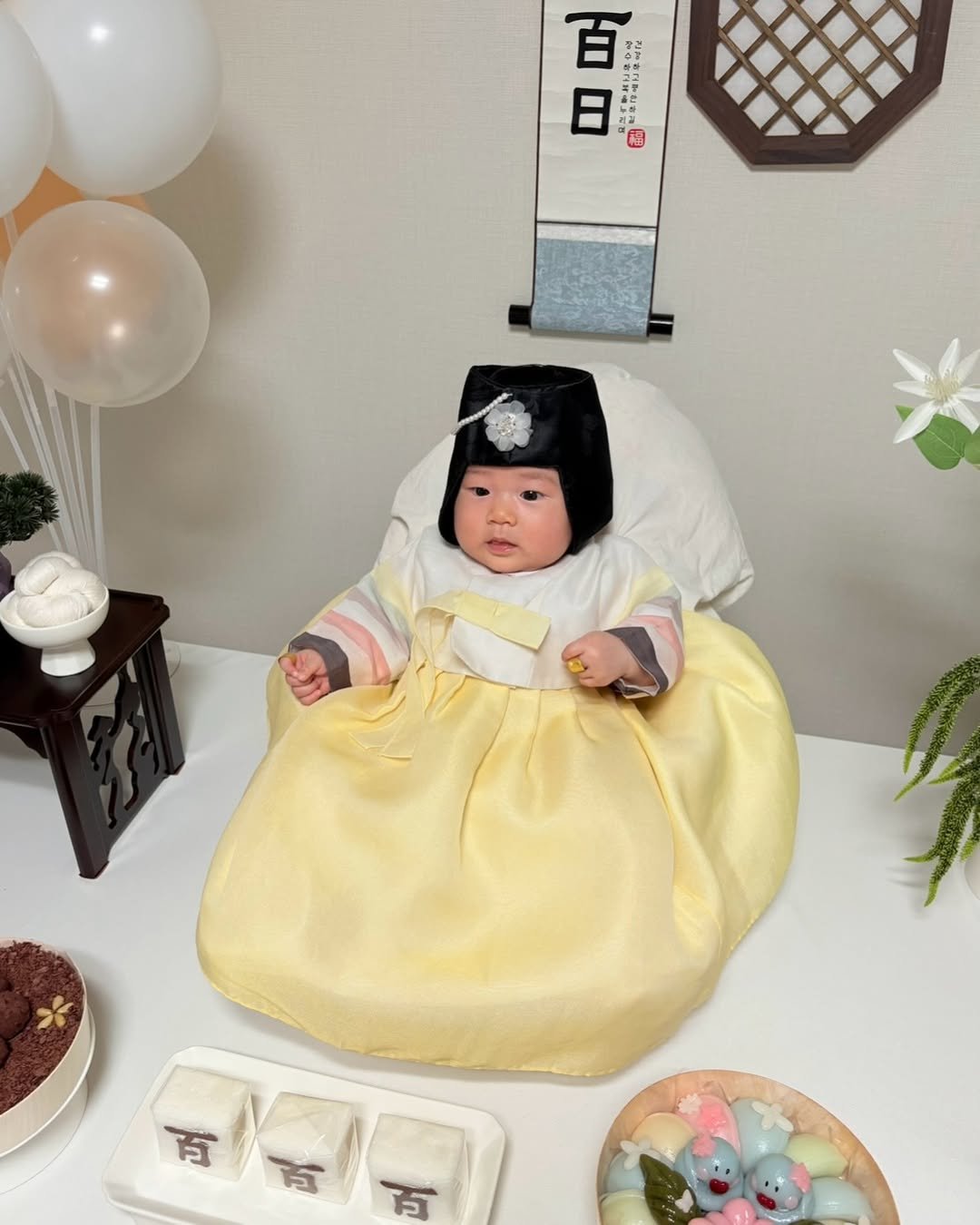 Photo shared by 새미 on November 24, 2025 tagging @100_s.woo. May be an image of cake and doll.
