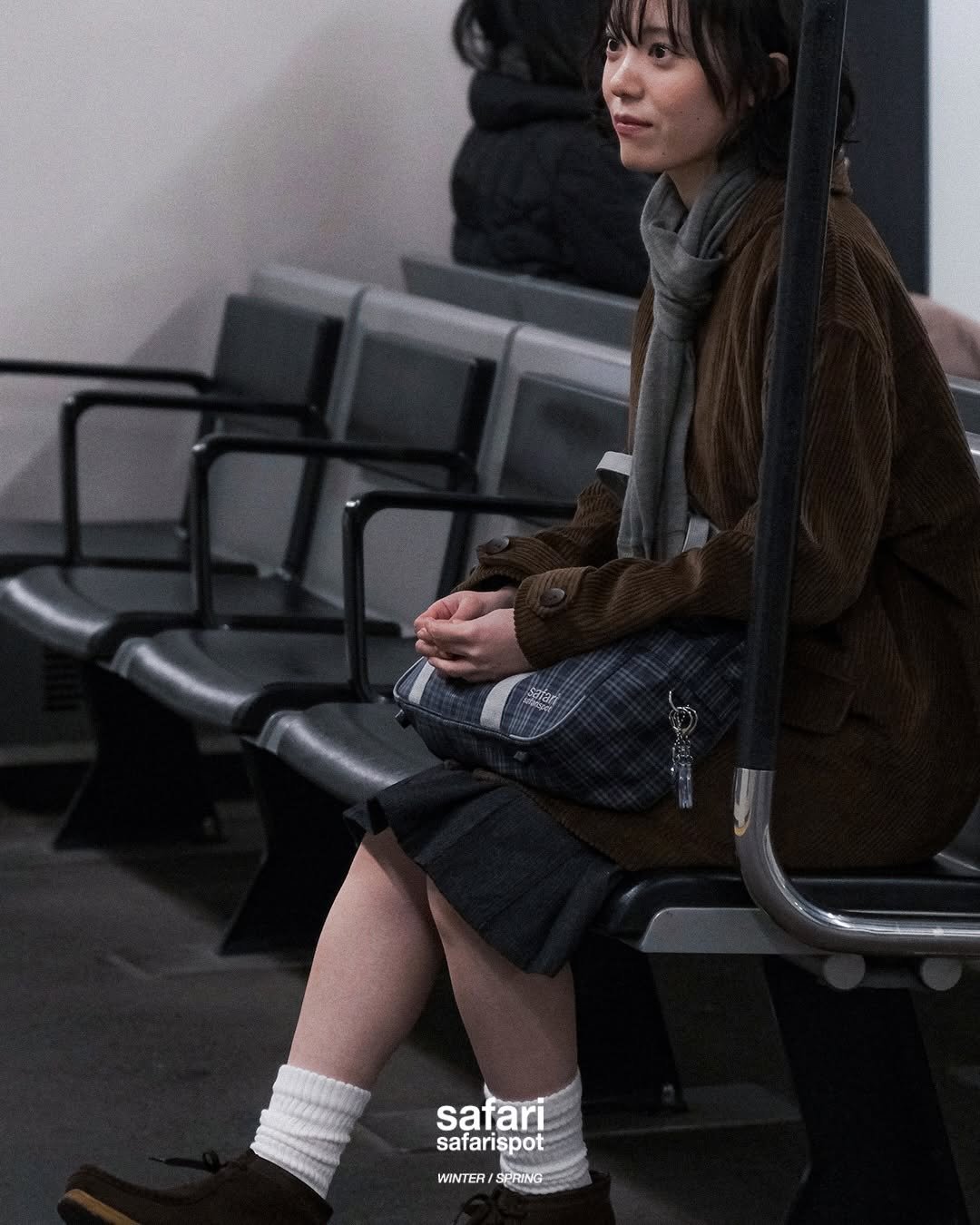 Photo by safarispot on December 15, 2025. May be an image of one or more people, duffle coat, terminal and text.