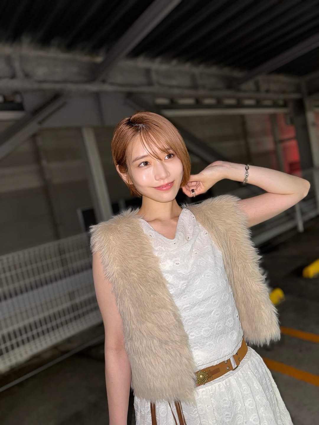 Photo by 河北彩伽  KawakitaSaika on August 27, 2025. May be an image of 1 person, hair, fur, vest, dress and text.