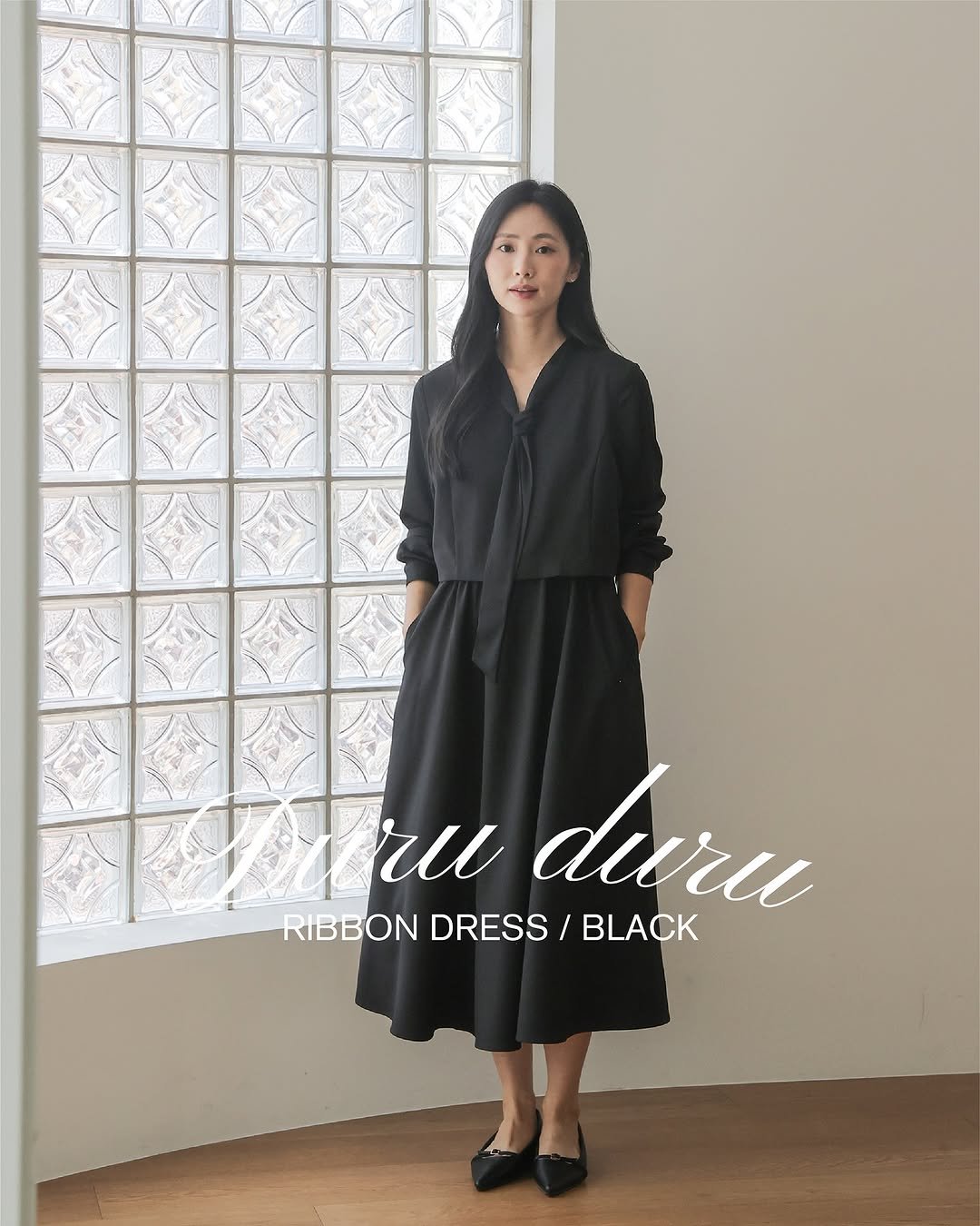 Photo by 세일러즈 on September 24, 2025. May be an image of 1 person, dress and text that says 'ru duru RIBBONDRESS/BLACK BLACK RIBBON DRESS'.