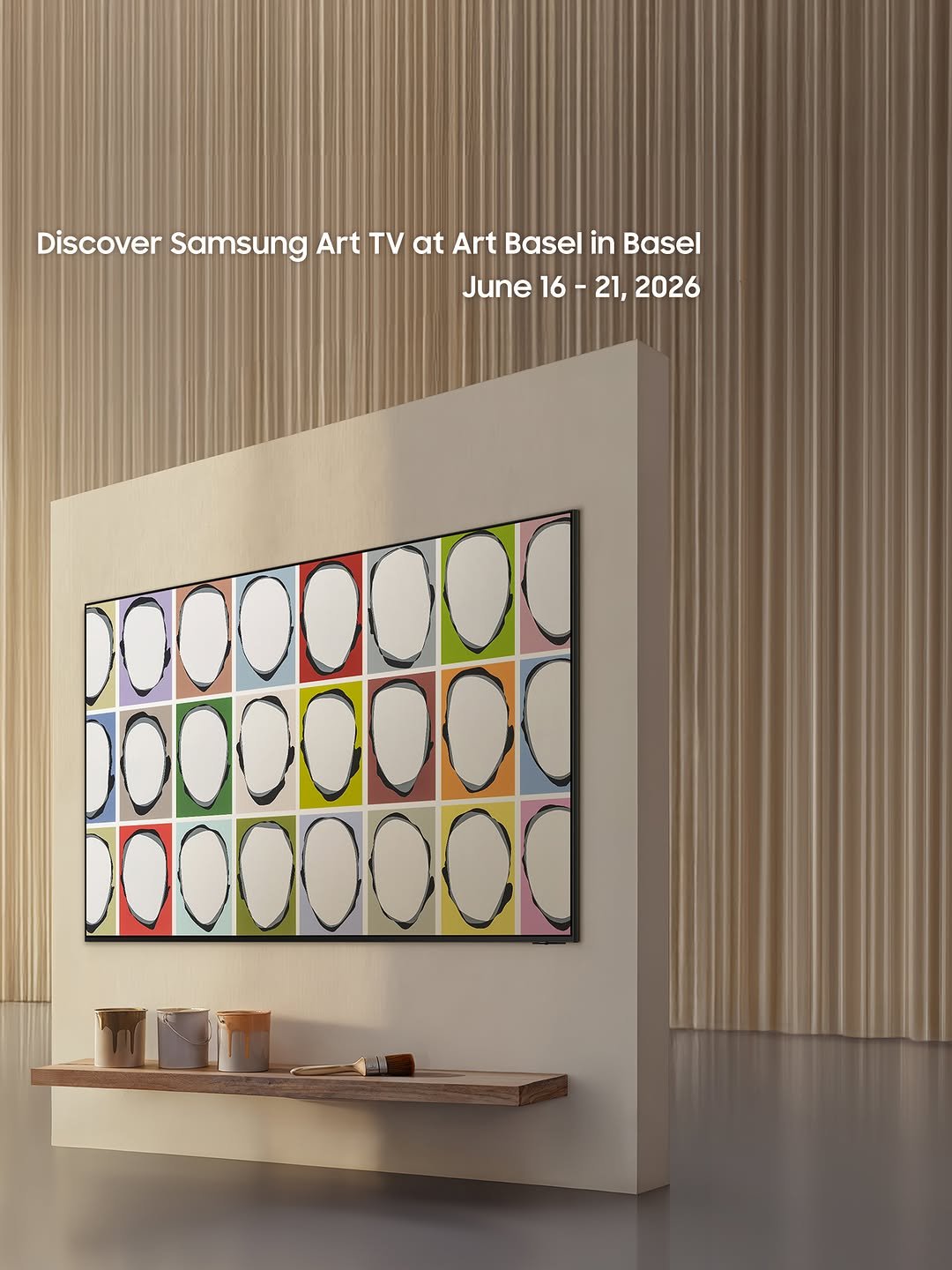 Set against a warm, gallery-inspired backdrop, three TVs are displayed on separate wall panels, each featuring a distinct artwork. On the left, the Samsung OLED TV showcases a pastel-toned abstract artwork with intersecting lines and geometric shapes. In the center, Samsung The Frame Pro TV displays a vibrant, mixed-media abstract composition bursting with color. On the right, the Samsung Micro RGB TV presents a pop-art-inspired grid of bold, colorful circular shapes. The headline "The answer to your artistic style" is overlaid in white text on the left and center panels, while the upper right reads "Discover Samsung Art TV at Art Basel in Basel, June 16–21, 2026." Paint cans, brushes, and a palette are placed around the displays, reinforcing the artistic, gallery-like atmosphere.