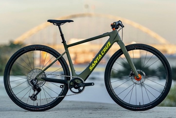 Photo shared by Santa Cruz Bicycles on December 17, 2025 tagging @chriskingbuzz. May be an image of bicycle, wheel and text that says 'CRUZ CRUZ SANTA SANTA'.