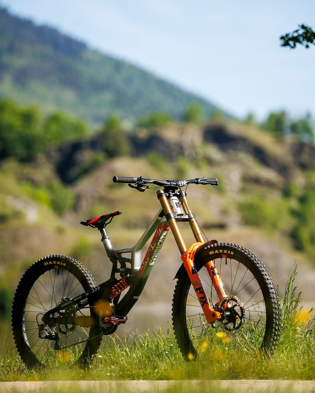 Photo shared by Santa Cruz Syndicate on November 12, 2025 tagging @santacruzbicycles, @maxxisbike, @shimanomtb, and @ridefoxbike. May be an image of bicycle, scooter and text.