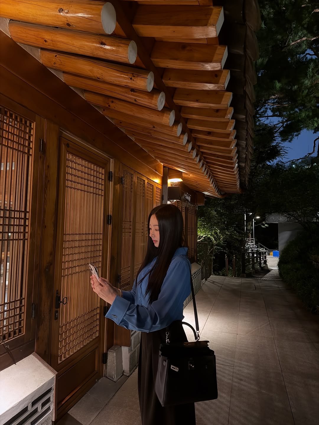 Photo by 김사랑 sarang Kim. on October 12, 2025. May be an image of wind chime, lantern, Fushimi Inari Taisha, hallway and text.