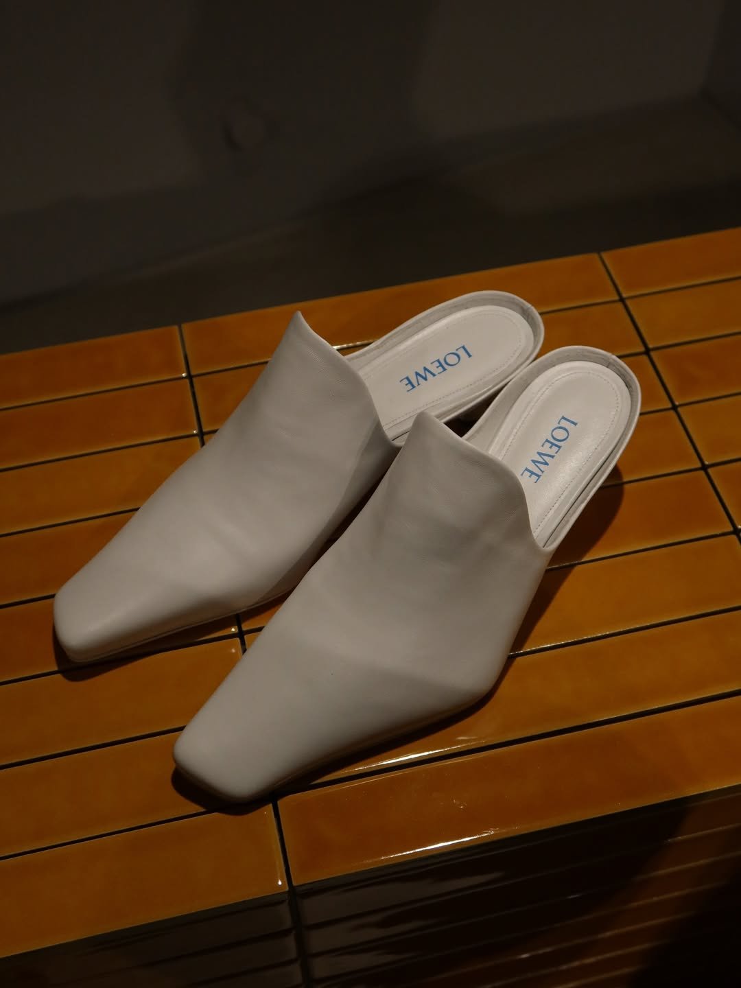 Photo shared by 서눙 on January 28, 2026 tagging @loewe. May be an image of sandals, toecap shoes, slingback shoes and text.