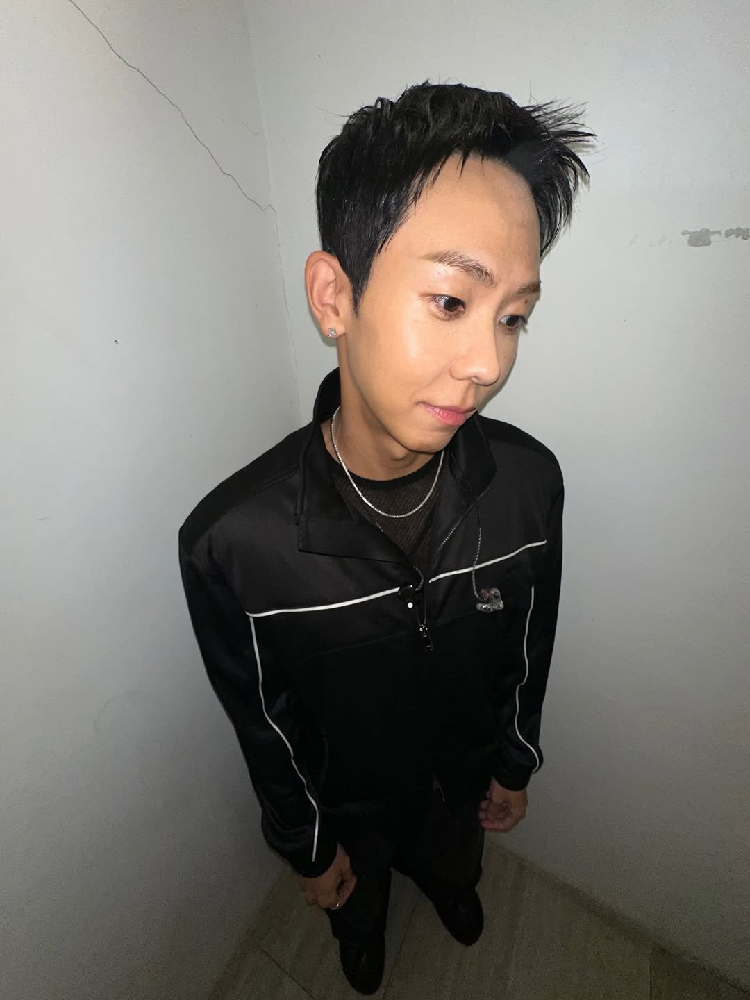 Photo by Loco | 로꼬 on November 20, 2025. May be an image of one or more people, bangs, top, bolo tie and text.