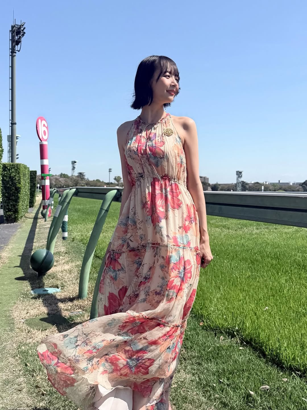 Photo by 岡田紗佳 on April 12, 2026. May be an image of dress, sundress and text.