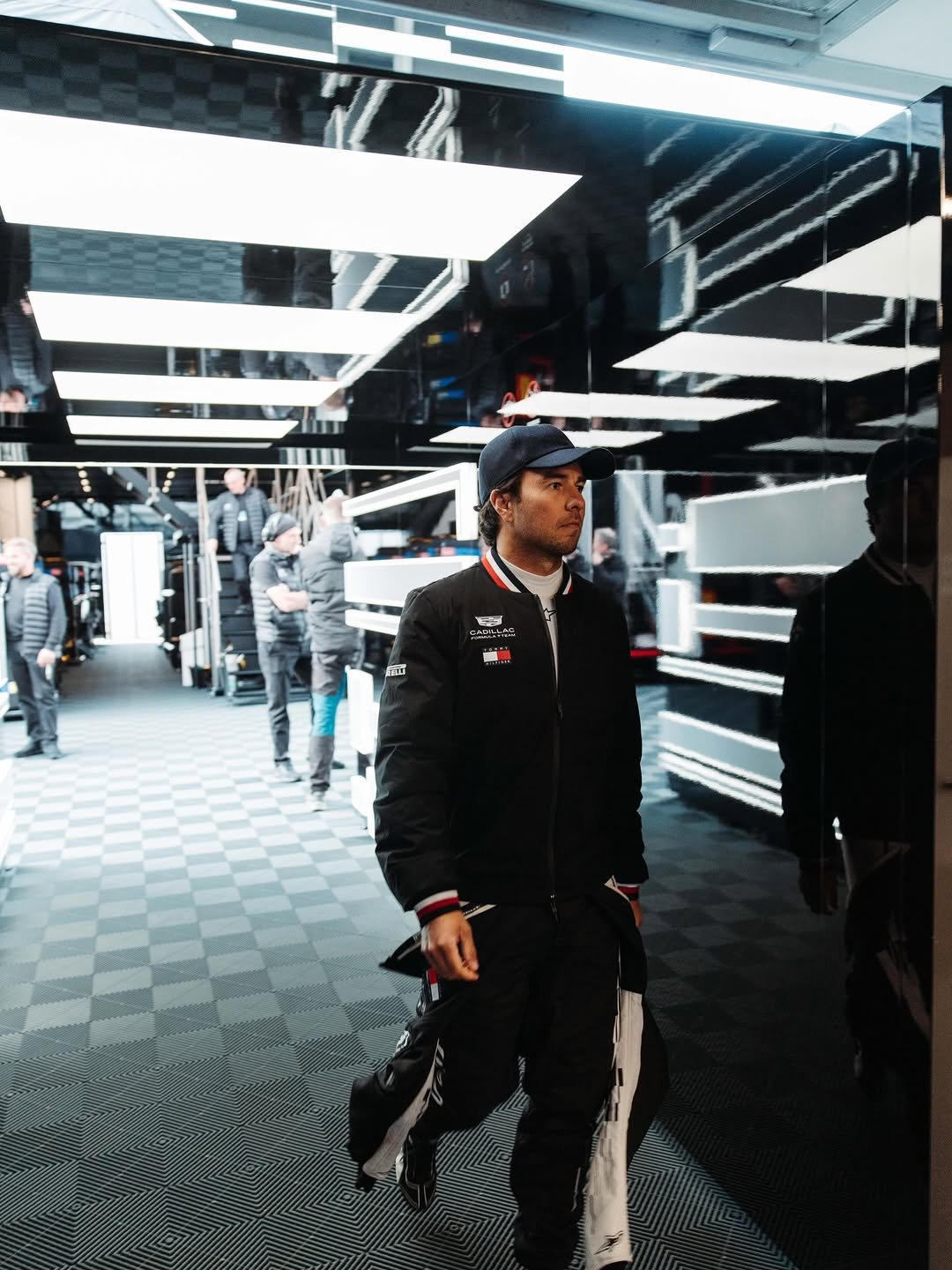 Photo by Checo Pérez on January 26, 2026. May be an image of one or more people, people standing, mirror and text.