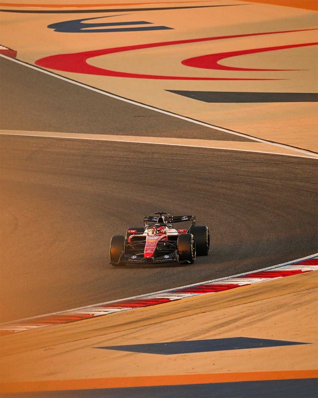 Photo shared by Scuderia Ferrari HP on February 20, 2026 tagging @charles_leclerc. May be an image of racing vehicles, race car and text.