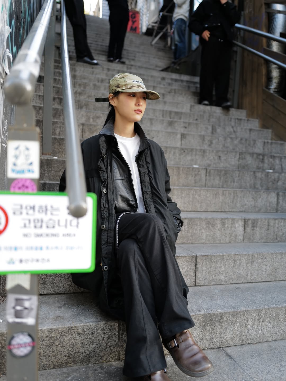 Photo shared by 𝗦𝗖𝗨𝗟𝗣𝗦𝗧𝗢𝗥𝗘 on February 25, 2026 tagging @anyteeshop. May be an image of one or more people, street and text.