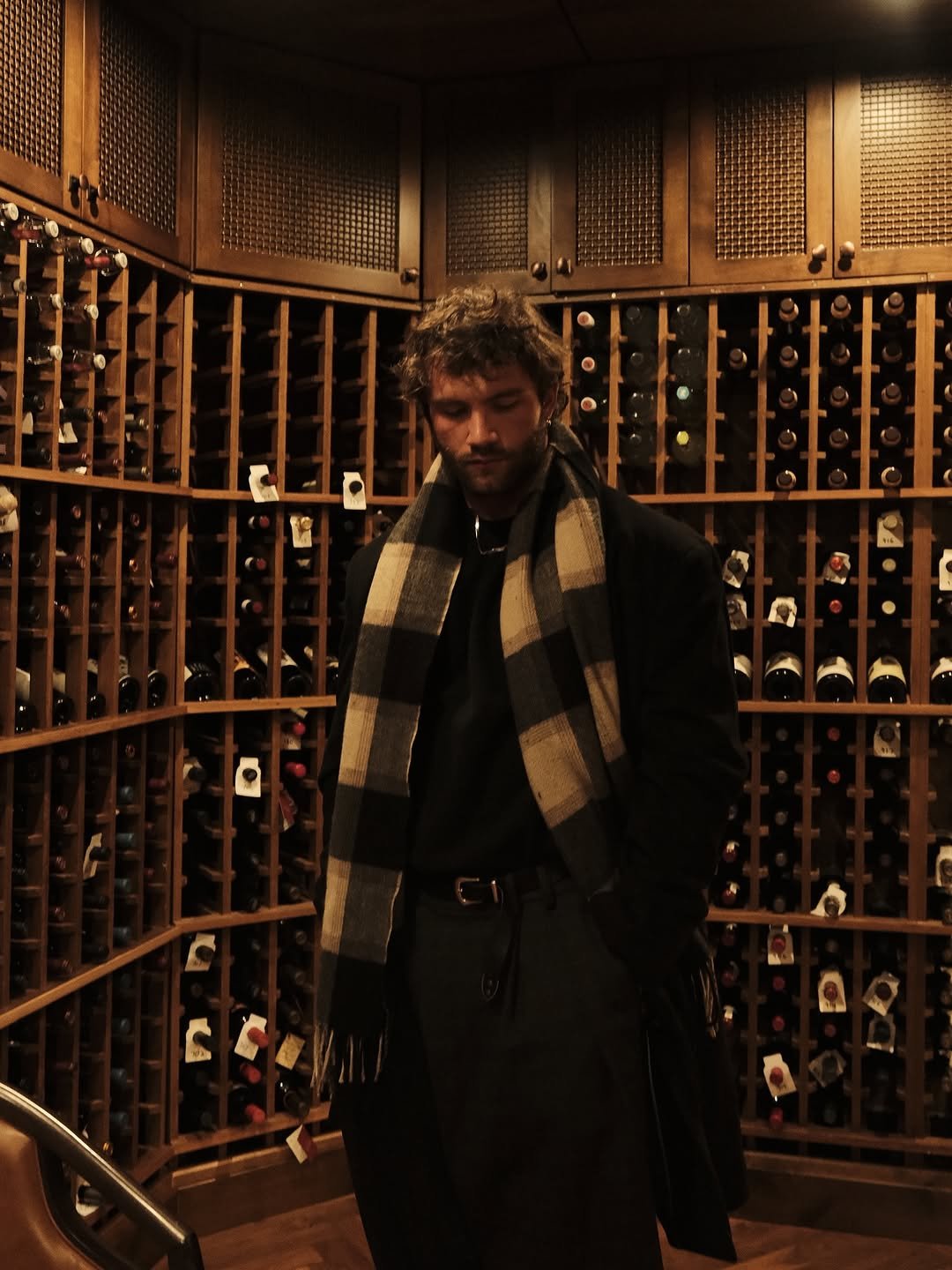 Photo by Sean on October 26, 2025. May be an image of wine, overcoat, rack, wine bottle and text.