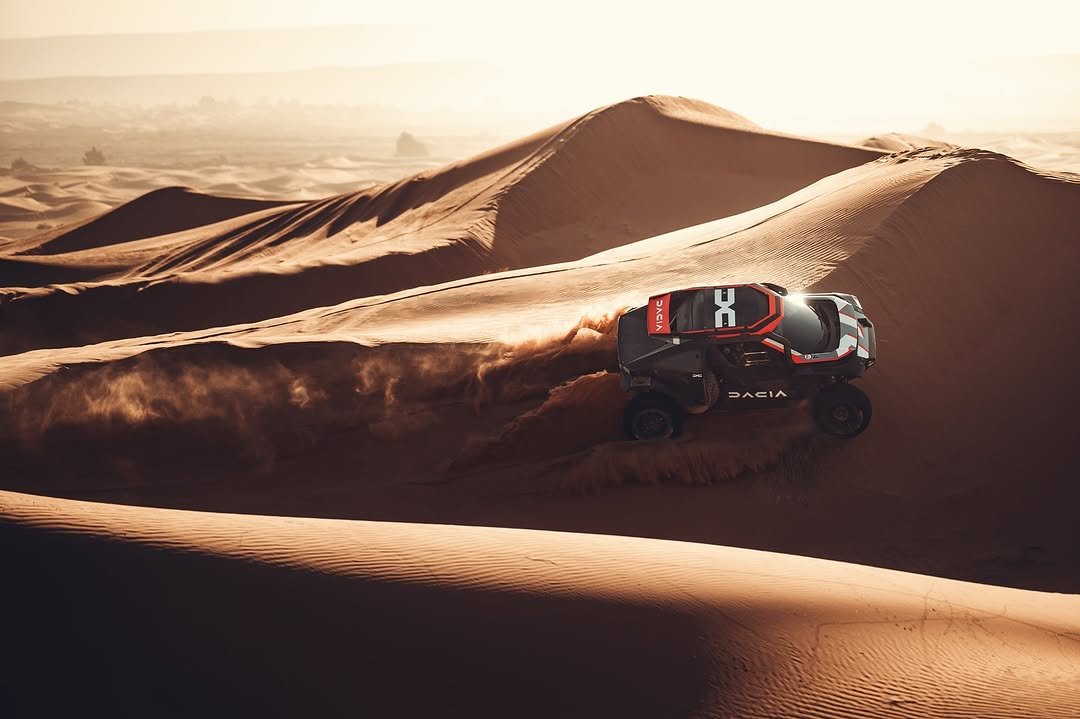 Photo by The Dacia Sandriders in Saudi Arabia with @cris_tortu, @dakarrally, @lucasmoraes23, @denniszenz, @diverse_extremeteam, @aramco, @sabeltofficial, @nasser_dakar, @sebloebofficiel, @bfgoodricheurope, @edouard_boulanger, @fabianlurquin, @pablomorenohuete, @roole_fr, and @officialw2rc. May be an image of all-terain vehicle, motorcycle, dune buggy, buggy, wheel, outdoors and text.