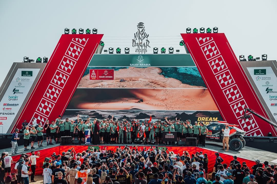 Photo shared by Sébastien Loeb on January 19, 2026 tagging @redbulldesertwings, @bardahl_official, @bfgoodricheurope, @edouard_boulanger, and @the_dacia_sandriders. May be an image of crowd, stadium and text.