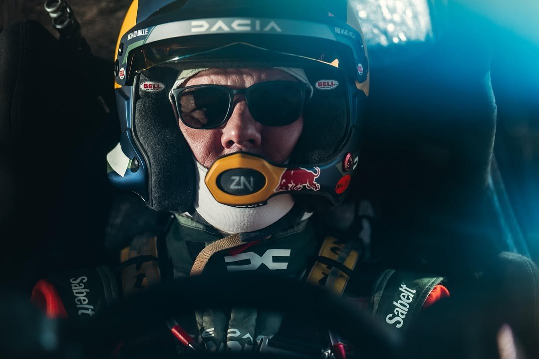 Photo shared by Sébastien Loeb on January 15, 2026 tagging @redbulldesertwings, @bardahl_official, @bfgoodricheurope, @edouard_boulanger, and @the_dacia_sandriders. May be an image of racing vehicles, race car, glasses, helmet and text that says 'E DACI人 BELL AC C Sabelt'.