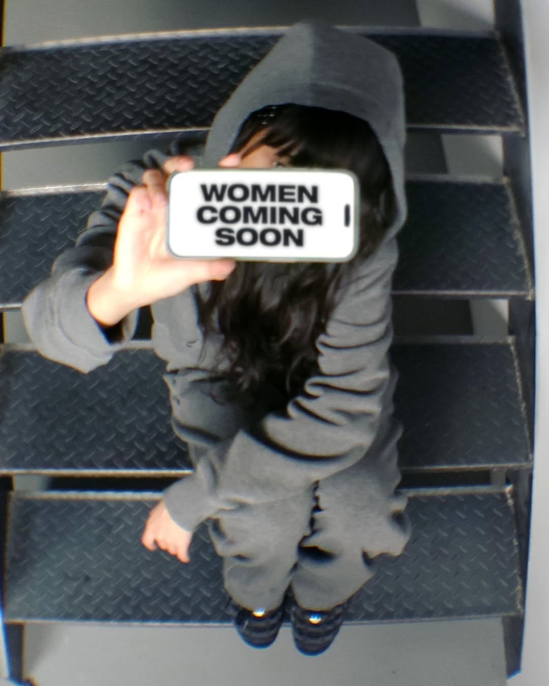 Photo by 세컨모놀로그 on September 14, 2025. May be an image of 1 person, sweatpants, sweatsuit, sweatshirt and text that says 'WOMEN COMING SOON'.