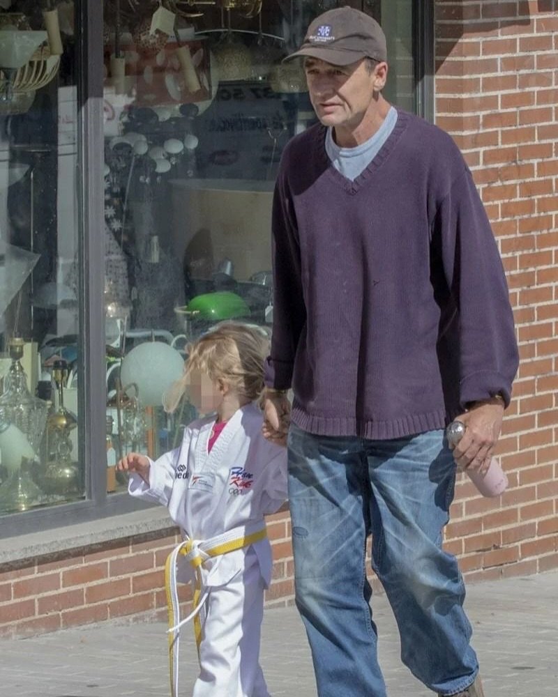 Photo by seesawboard | 취향 보관함 on July 25, 2025. May be an image of 2 people, child, people standing, street and text.