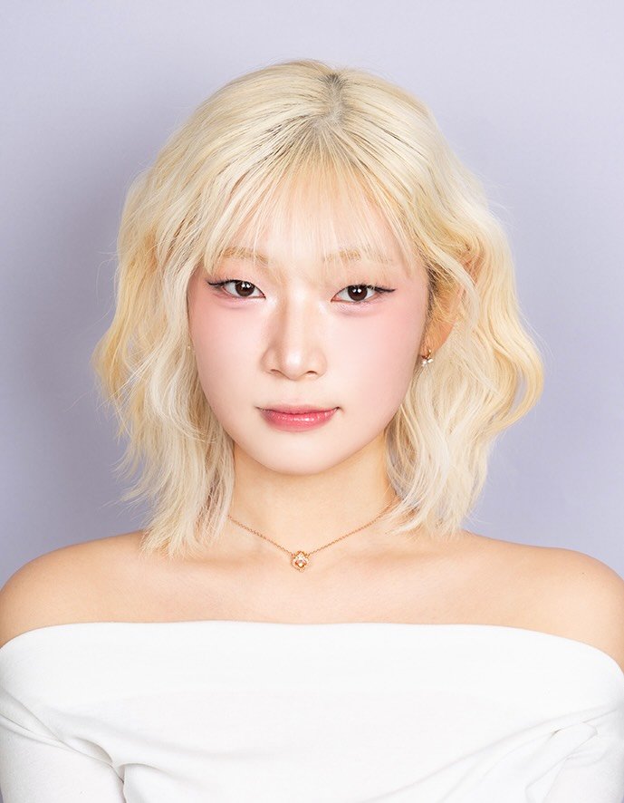 Photo shared by 김 남희 on January 21, 2026 tagging @sensibility0624. May be a closeup of one or more people, bangs, braids, blonde hair, makeup and text.