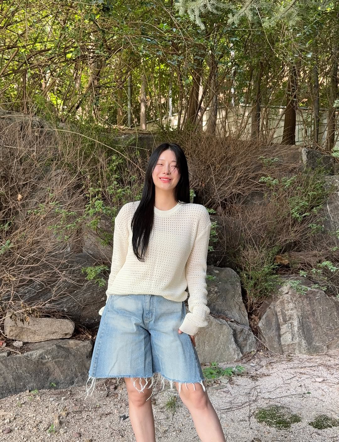 Photo shared by 서시아 on August 12, 2025 tagging @hacie_official. May be an image of 1 person, miniskirt, shorts, top, outdoors and text.