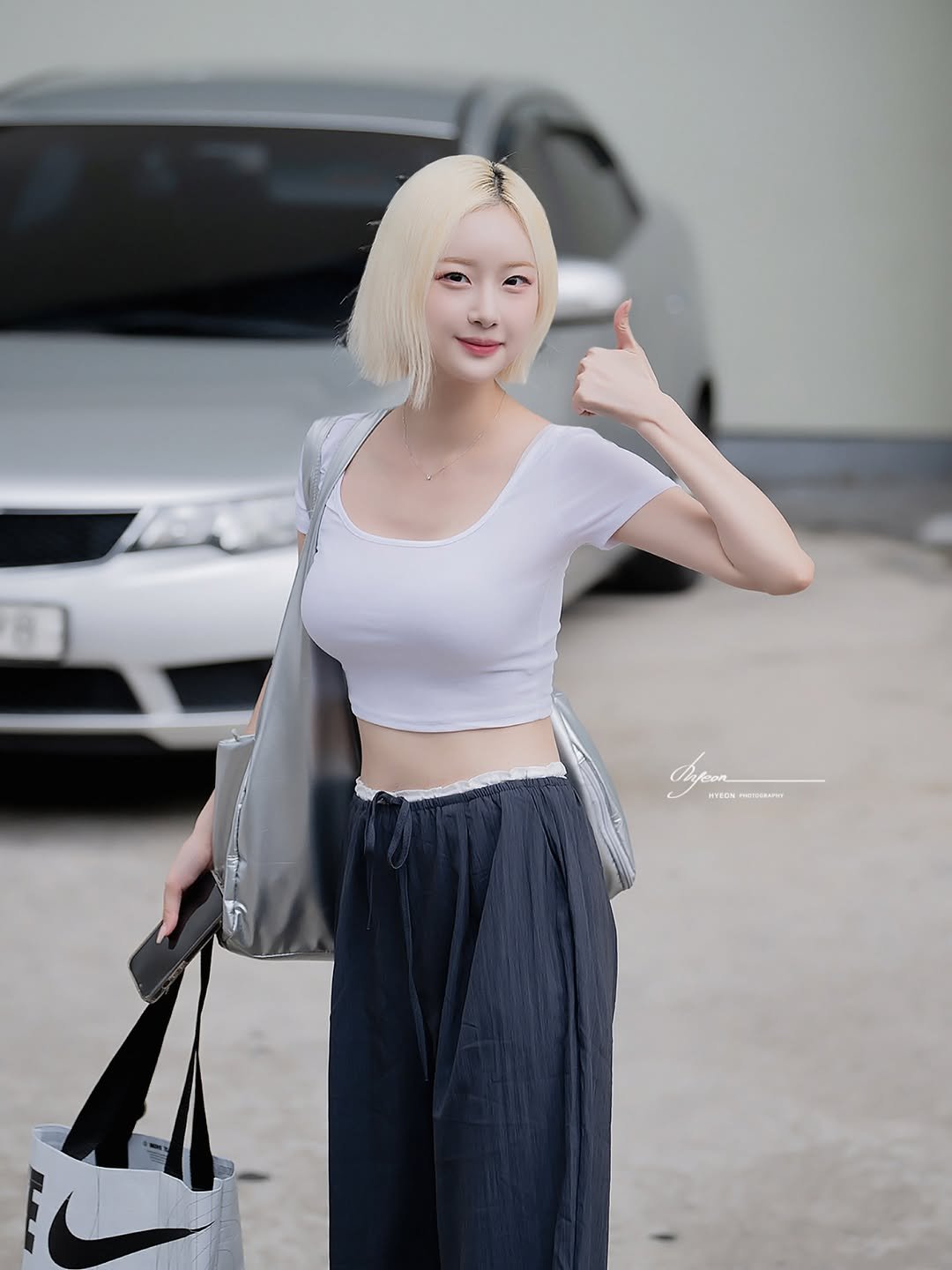 Photo by 서현숙 in 잠실야구장. May be an image of 1 person, blonde hair, top and text.