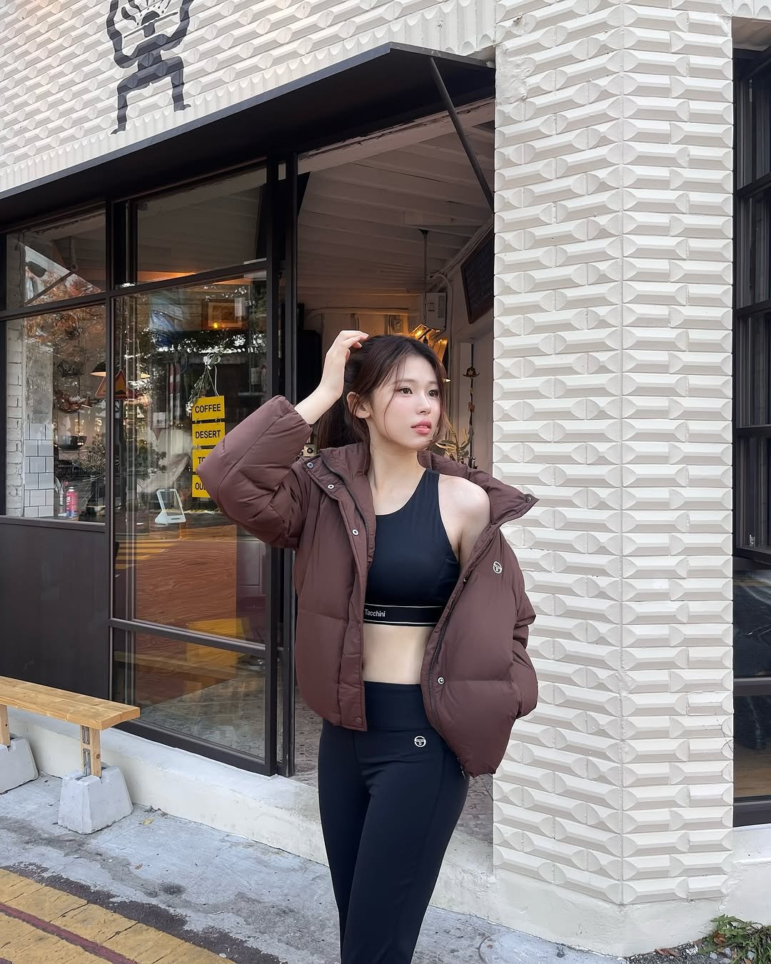 Photo shared by 안민서 on November 13, 2025 tagging @sergiotacchini_kr. May be an image of duffle coat, goosedown coat, turtleneck, parka, sweatpants, flight jacket and text.