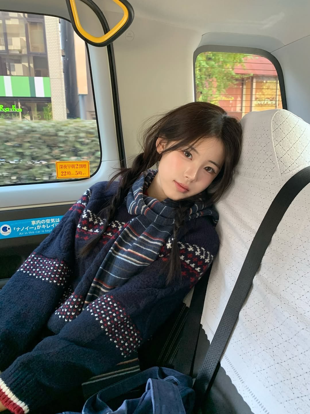 Photo shared by 안민서 on December 01, 2025 tagging @kimaura.official. May be an image of one or more people, hair, bus, parka and text.